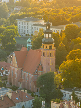 Catholic parish of saints peter and paul church in puck, poland during sunset