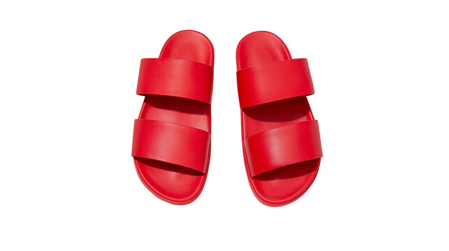 Pair of bright red double-strap slide sandals, isolated on transparent background