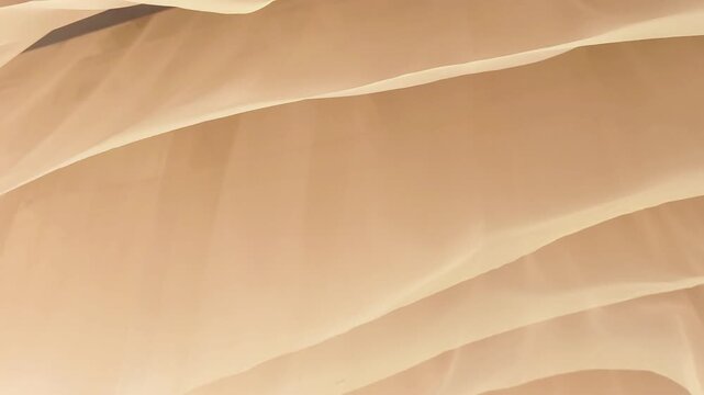layers of thin beige fabric swaying gently in the wind. soft fabric ripples create elegant abstract background. concept of abstract fabric texture for creative intro and underlay design