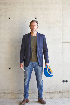 Portrait of confident architect on construction site