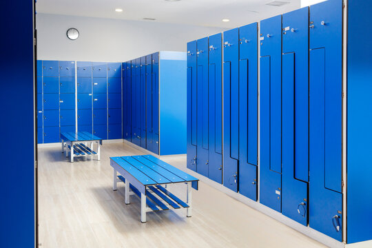 Empty blue locker room at gym