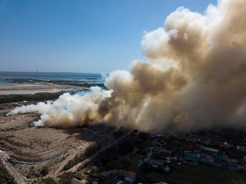 Indonesia, Bali, Aerial view of Sanur, fire, smoke