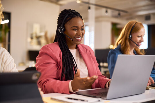 Black happy woman on video call with big smile