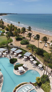 Elevated View of Resort Cabanas Beside Beach and Pool