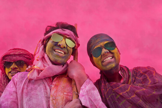 Portrait of Indian men playing holi