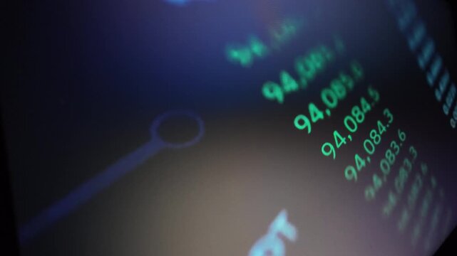 Digital financial stock market data numbers scrolling on computer screen