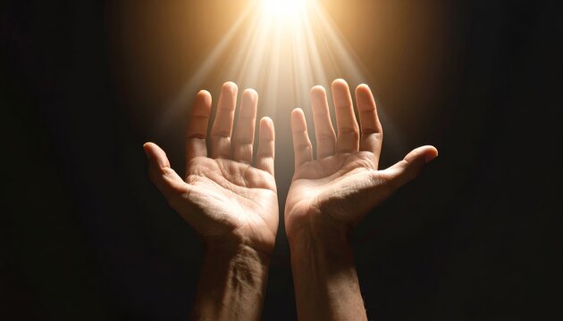 Two hands reaching upward toward bright golden light, set against a dark background