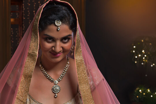 Woman in bridal dress giving naughty look