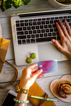 concept girl online shopping with laptop mock up top view