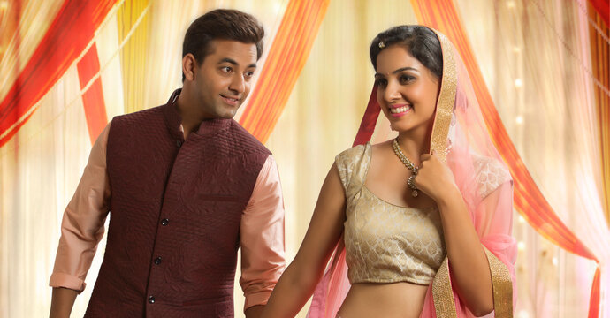 Beautiful young couple in traditional dress