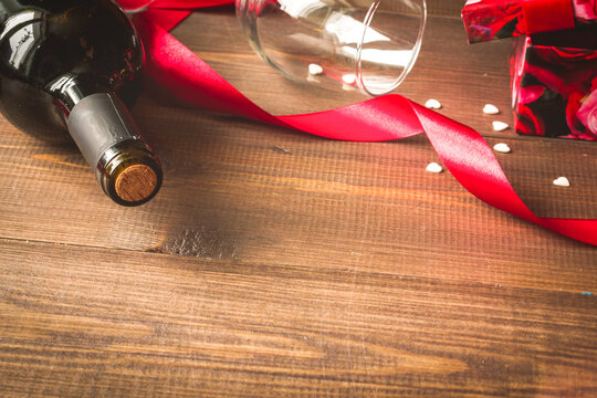 concept Valentine Day with wine at wooden background