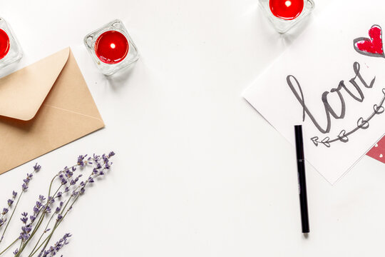 concept of Valentine Day love letter white background top view