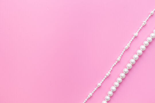 Natural white pearls - beads for jewelry, top view. Precious and elegance concept background
