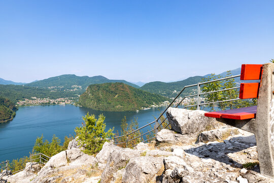 A bird&rsquo;s-eye view of the landscape overlooking Mount Caslano in Ticino. A sunny summer&rsquo;s day. The lake is a beautiful shade of blue.