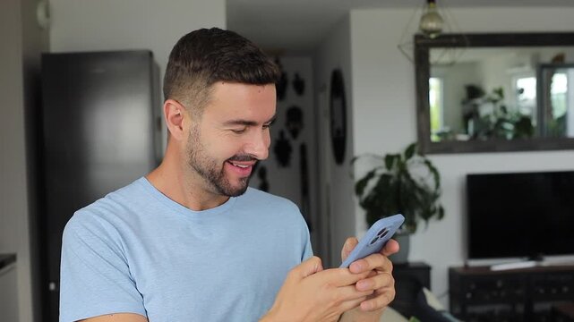 Man typing on his smartphone 