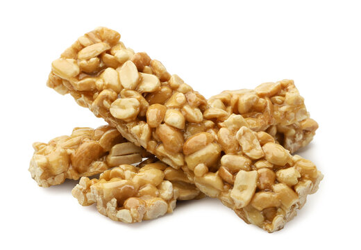Peanut caramel bars close-up on a white. Isolated