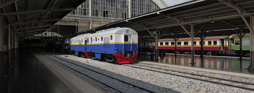 Restored vintage blue and white Davenport 500 HP diesel-electric locomotives sit on the tracks at Hua Lamphong railway station in Thai capital Bangkok