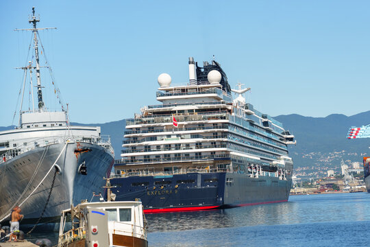 Rijeka, Croatia - June 7, 2026: Luxury cruise ship Explora II moored in the Port of Rijeka, Croatia, with surrounding harbor infrastructure and mountains in the background