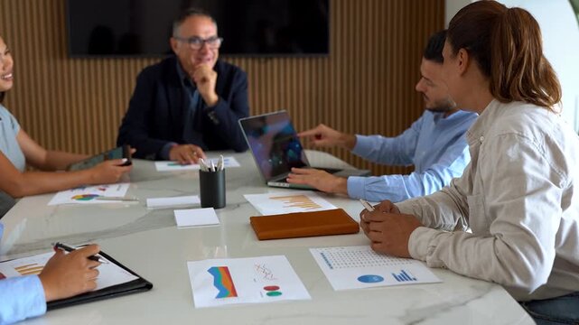 Multi generational business people sharing ideas during team meeting inside modern office - Multiracial colleagues, entrepreneur and corporate concept