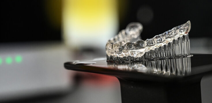
3D-printed plastic dental splint for tooth correction or use as an occlusal splint (bite guard) &ndash; produced by dentists or dental laboratories for conditions such as bruxism.