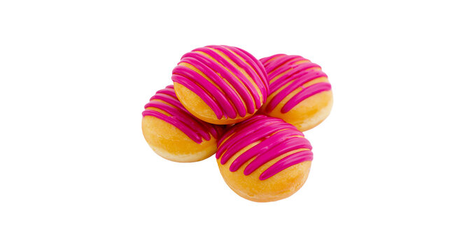 Four mini donuts with bright pink icing drizzle, isolated on transparent background