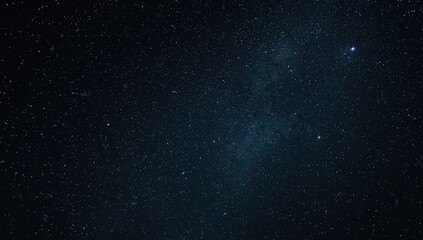 Fototapeta premium Twinkling Stars in a Clear Night Sky with Deep Blue Background