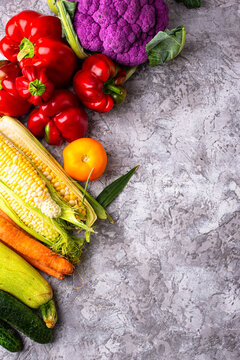 Corn, pepper, cauliflower, carrot, cucumber, tomato and zucchini