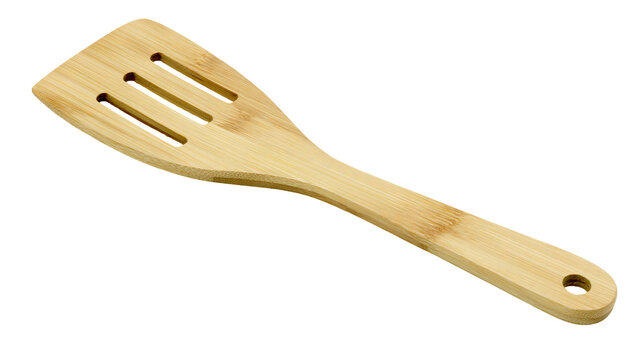 Slotted bamboo spatula with hole in handle, isolated on transparent background