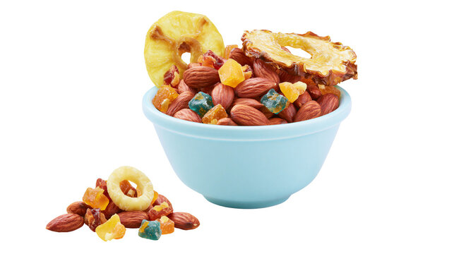 Light blue bowl filled with almonds dried pineapple rings and colorful candied fruit pieces, isolated on transparent background