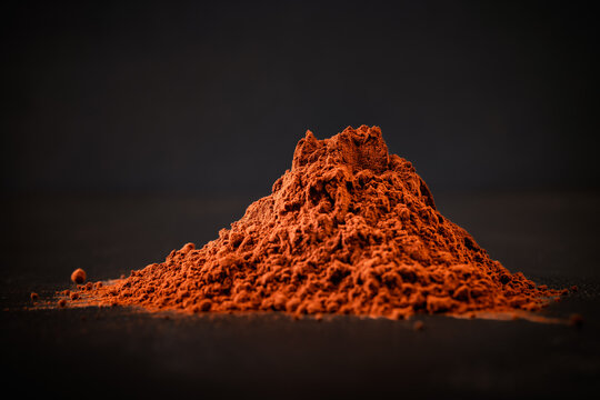 Pile of rich cocoa powder ingredient for baking and desserts