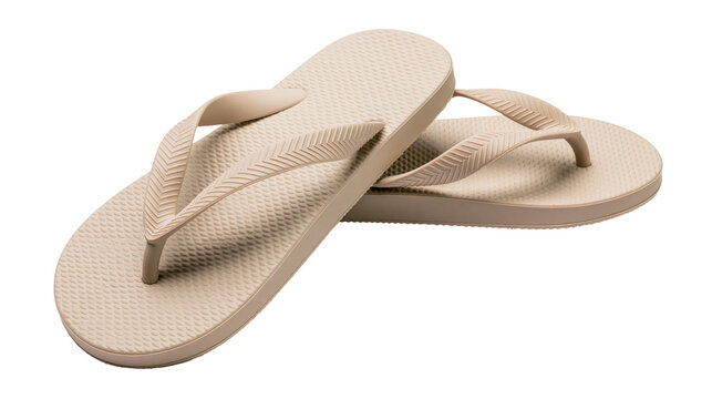 Pair of beige rubber flip-flops with textured soles, isolated on transparent background
