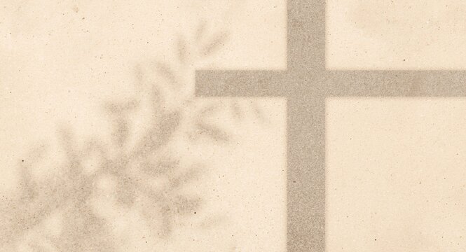 Cross Shadow on Textured Background with Subtle Leaf Silhouette