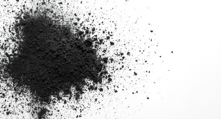 Fototapeta premium Black Powder Pile on White Background with Fine Texture