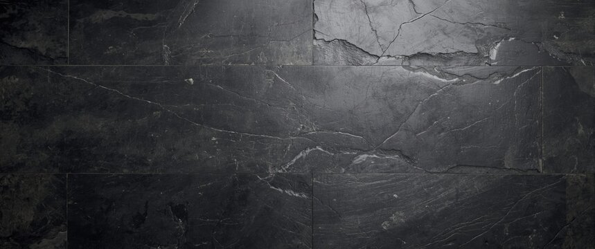 Textured Dark Slate Stone Surface with Subtle Veins and Variation