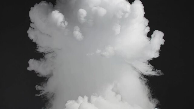 white smoke explosion with thick cloudy vapor on dark background