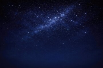Obraz premium Starry Night Sky with Bright Stars Against a Deep Blue Background