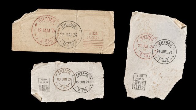 Torn vintage paper scraps with passport style entry stamps