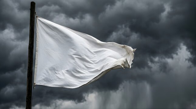 White flag waving on a pole against a dramatic stormy dark sky