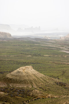 Aerial view of the dramatic limestone formations and vast desert landscape of the Bozjyra canyon in the Mangystau Region, Aktau, Kazakhstan.