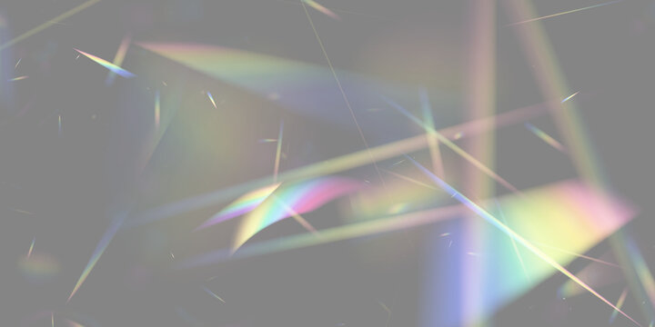 Multicolored light beams and prism reflections scattered against a dark background on transparent background
