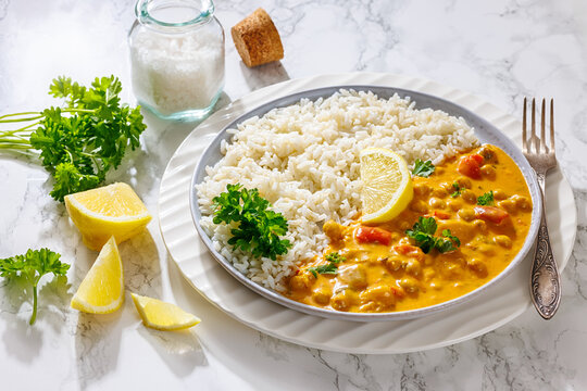 Chickpea curry with white rice on a plate