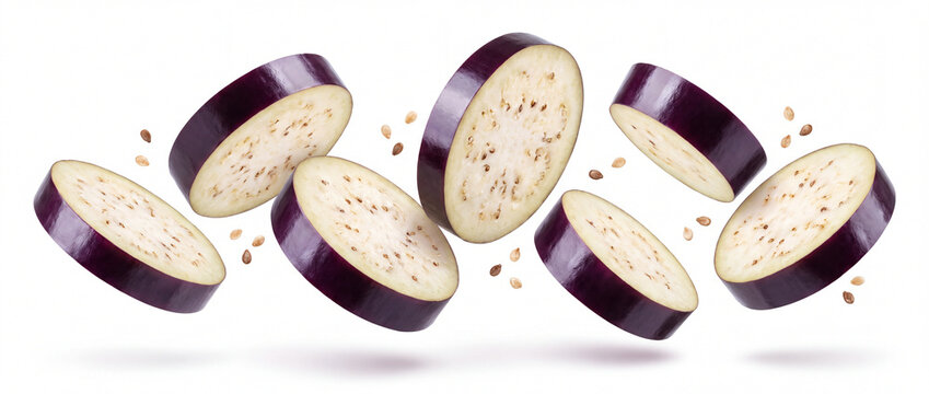 Sliced eggplant floating on white background with glossy purple skin, pale fresh flesh, and scattered seeds in levitation studio shot ideal for healthy food packaging and recipe banners