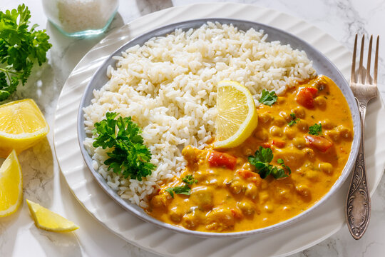 Indian chana masala dish with rice on plate