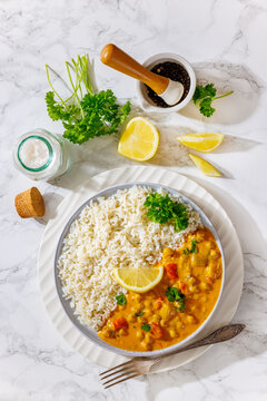 Indian chana masala dish with rice on plate