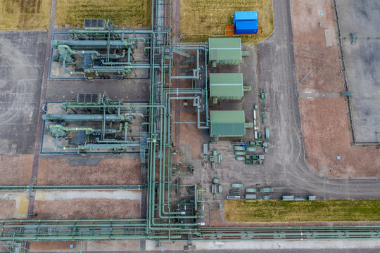 Aerial view of a hydrogen pilot project featuring industrial pipelines and storage units for alternative fuel infrastructure in Hoogeveen, Drenthe, Netherlands.