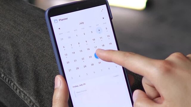 Minimalist planner app for daily tasks. User taps July 12 to review Cook dinner, then switches to July 13 for a Go for a walk event. Perfect for productivity software and personal scheduling