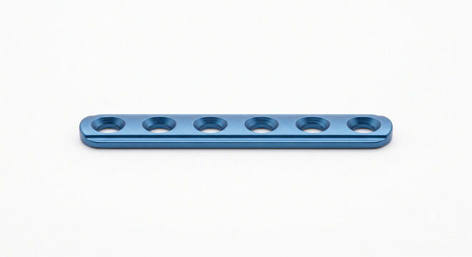 Macro of a titanium orthopedic bone plate. Surgically clean metallic bar with countersunk screw holes and anodized blue medical finish. Isolated on white.