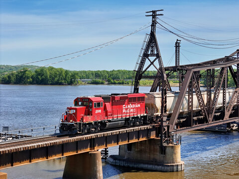 Sabula, Iowa  May 14, 2026 Canadian Pacific 2326 Locomotive pulling freight across a Steel Truss Bridge Over the Mississippi River