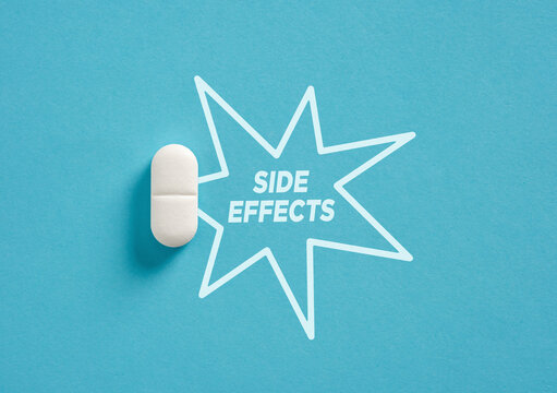 White Pill Causing Side Effects on Blue Background