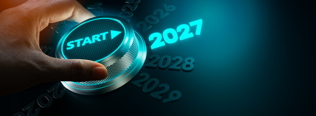 Obraz premium happy new year 2027,Finger about to twist the start button 2027 with the text 2025,2026,2028 and start on twist button.Concept of planning,start,career path,business strategy,opportunity and change